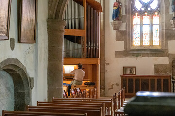 Ploumilliau (Plouilio), France. Organ inside the Eglise Saint-Milliau (St Miliau Church), a Roman Catholic Gothic temple in this small town of Brittany