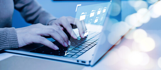 business woman using laptop computer with virtual graphic icon on desk at home office, document...