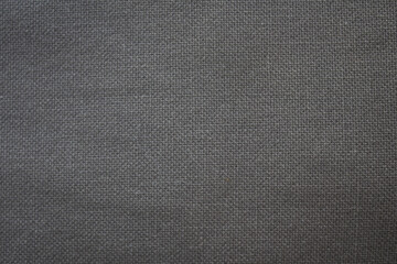 Fototapeta na wymiar The texture of the fabric is gray. Macro.