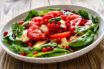 Mozzarella salad on wooden table
