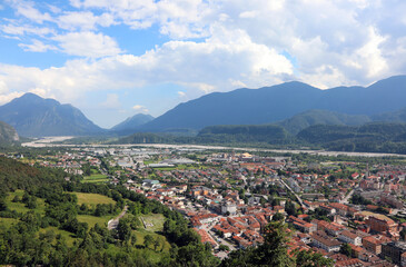 panorama of the city of Tolmezzo and a valley in the Alps mountains of Northern Italy