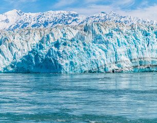 A view in Disenchartment Bay of moraine strata in the snout of the Hubbard Glacier, Alaska in summertime