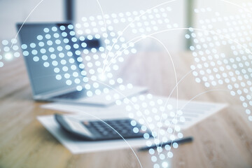 Abstract virtual world map with connections on calculator and laptop background, international trading concept. Multiexposure