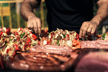 Barbecue in a food truck selling spicy sausages and chicken skewers - Alicante, Spain