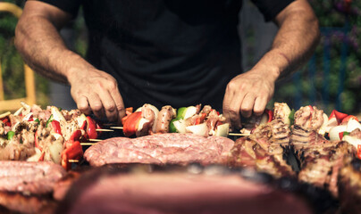 Barbecue in a food truck selling spicy sausages and chicken skewers - Alicante, Spain