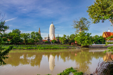 Fototapeta na wymiar the Chao Phraya River and Wat Phutthaisawan (Monastery of Buddhist Kingship) is an historic Buddhist temple Ayutthaya Historical Park Thailand. It is over 666 years old. 