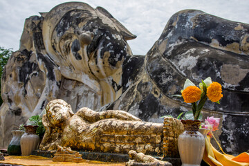 the largest Reclining Buddha statue  in Wat Lokayasutharam Ayutthaya Thailand. 
At 42 metres long and 8 metres high, the statue towers over the devotees who come here to make offerings.