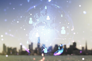 Virtual social network hologram and world map on blurry skyline background. Multiexposure