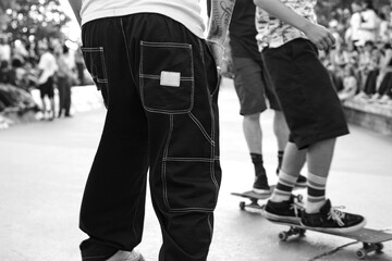 Group of skateboarders at skate park.