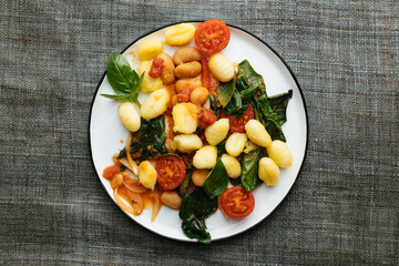Gnocchi with Tomatoes, Spinach and Giant Beans