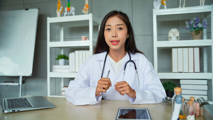 Female doctor is giving advice to people with health problems and making the body healthy, not easy...