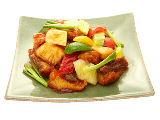 Sweet and sour chicken with colorful bell pepper on a plate Isolated on whiye background.