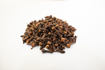 Cloves isolated on a white background- dried Indian herb.