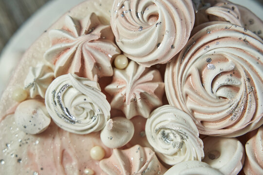 Birthday Cake For Girls. Pink Cake Decorated With Meringues Of Different Shapes. View From Above