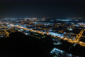 Fototapeta na wymiar Foto aérea noturna da cidade de Paulínia. Localizada no interior de São Paulo. Brasil 2022.