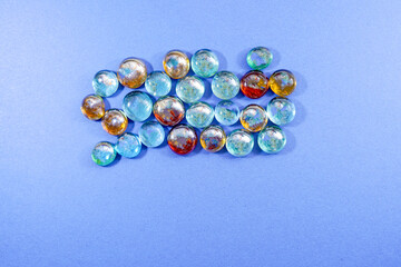 Glass made of crystal-like materials photographed in the studio with colorful background