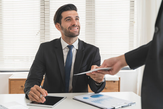 Close Up View Of Office Worker Receiving Salary From Boss.