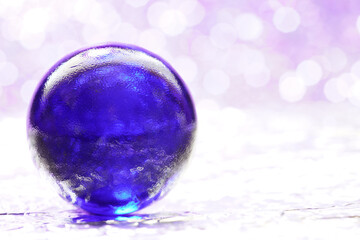 Glass made of crystal-like materials photographed in the studio with colorful background