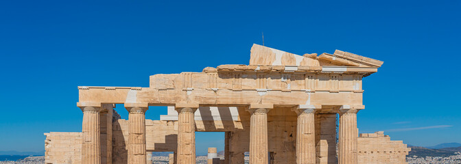 Ruins of Athena Nike Temple in the Acropolis of Athens in Athens, Greece. Partial panorama view