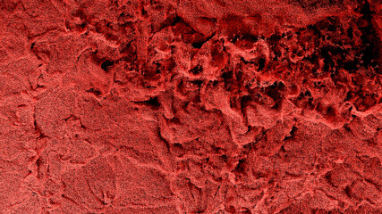 Millions of Tiny Red Particles Filling the screen with many Swirls and small Waves on Black