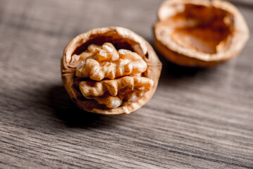 Healthy bio walnuts  on wood desk with detail background,  walnut on wood kitchen underlay.