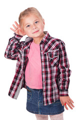 Studio shot portrait of thoughtful little girl who is eavesdropping. Copy space on white background.