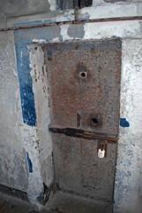 An aged jail door in Kilmainham Gaol in Dublin, Ireland, now a tourist spot.