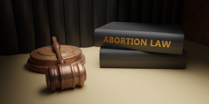 Abortion law. Pregnancy termination Legal or illegal. Judge gavel on Abortion Law book. 3D Render