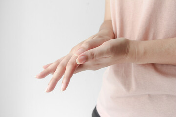 Woman hands using antiseptic alcohol based hand sanitizer gel