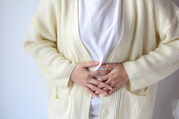 woman suffering from stomach ache, feeling abdominal, menstrual pain, belly abdominal, diarrhea...