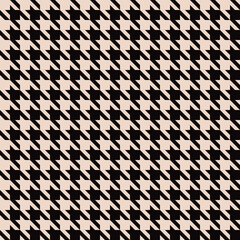 Seamless houndstooth pattern in black and beige. Vector textile background
