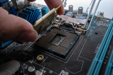 putting CPU on socket of the computer.
