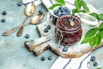 blueberry jam in a jar. Homemade food concept. place for text, top view