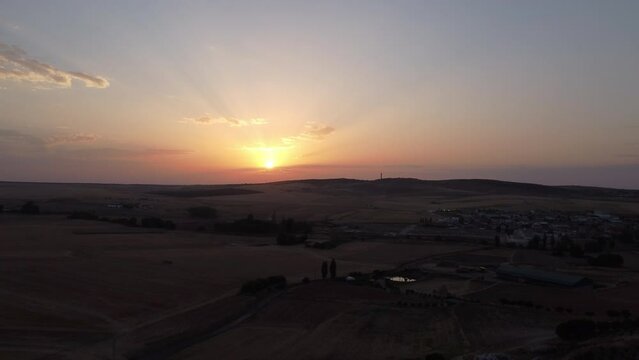 Aerial drone video at sunset with crop fields from Arapiles, Salamanca.
