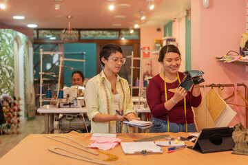Obraz premium Women working in a sewing workshop