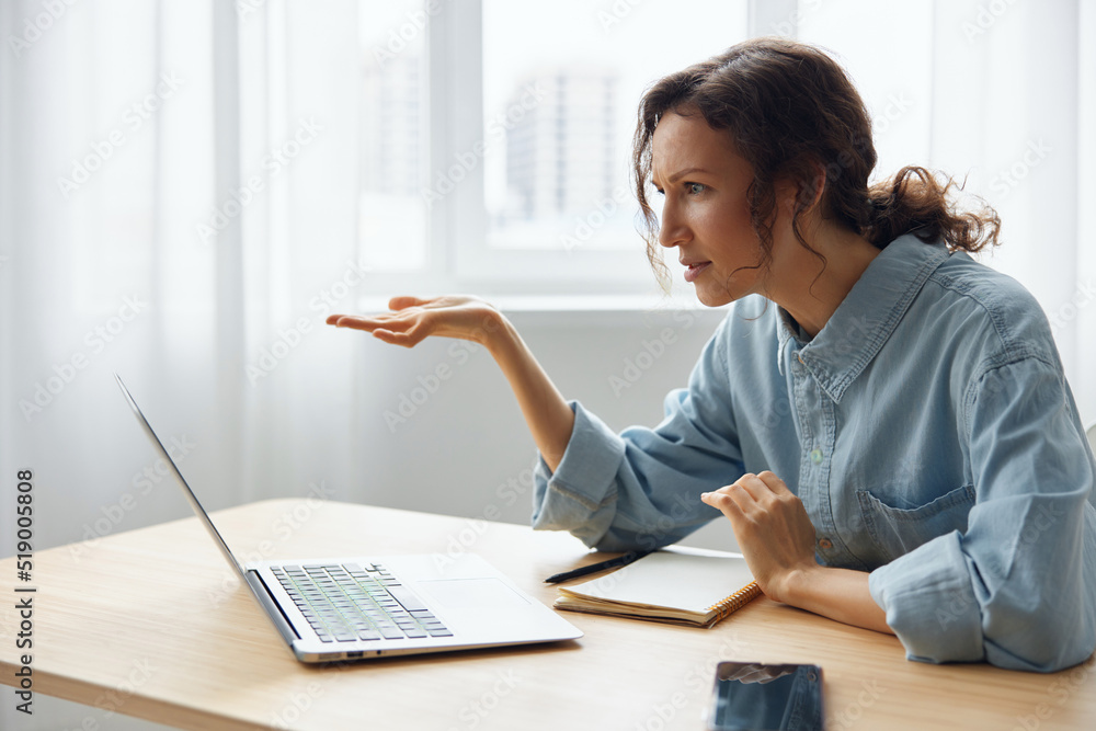 Aufkleber what is happened. confused unhappy beautiful curly woman office worker in perplexity raises hand up 