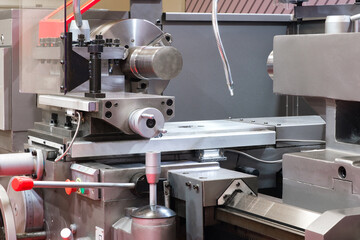 Manufacturing CNC professional lathe machine. Industrial concept. Close-up, industrial metalworking concept
