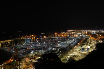 Fototapeta na wymiar Night Panoramic view of barcelona and cargo port in spain