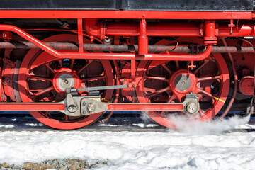 Wheels and rods on a steam train locomotive of Brockenbahn railway on Brocken mountain in Germany