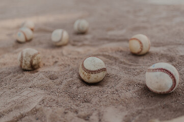 Fototapeta na wymiar Baseballs in Dirt