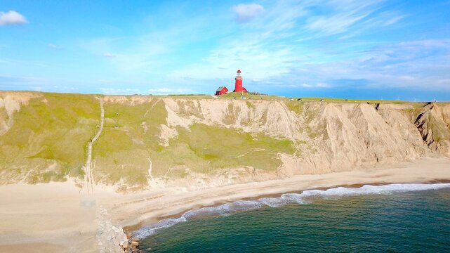 aerial view from the North Sea to the Bovbjerg Fyr lighthouse in Jutland, Denmark, landmark, high quality image, holiday, attraction, travel