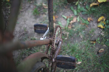 Pedals and chain on an old rusty bicycle