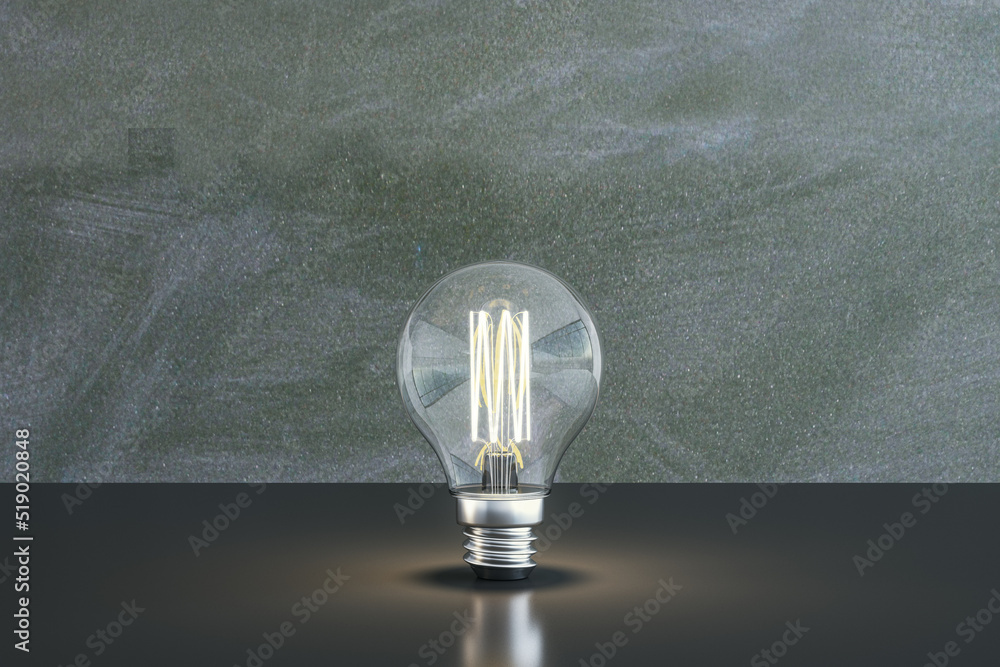 Poster Close up of illuminated light bulb with filament on chalkboard wall background. New idea and innovation concept. 3D Rendering.