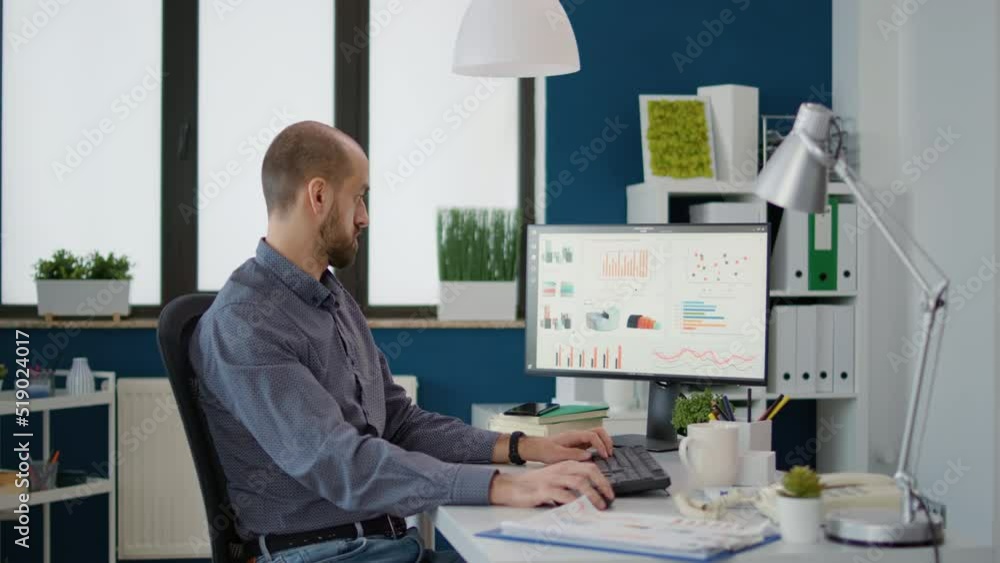 Poster business man doing financial research on computer in startup office to work on sales development. ex
