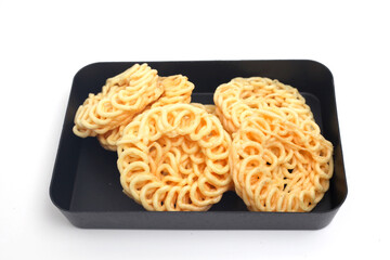 Kerupuk or crackers are one of the favorite snack in Indonesia. Isolated on white background