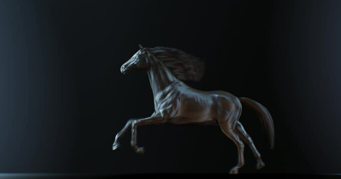 Galloping slow motion stallion against black background with side light on body, horse loop animation