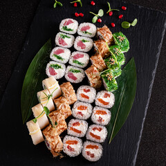 sushi on the black background