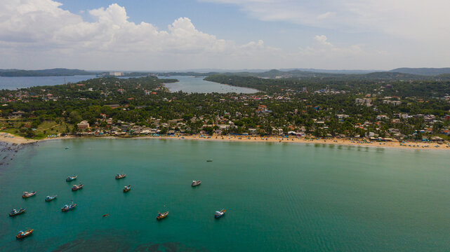 Aerial panorama of the city of Trincomalee with hotels and houses. Tourist infrastructure in Sri Lanka.