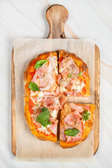 italian pizza on the wooden board