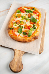 italian pizza on the wooden board